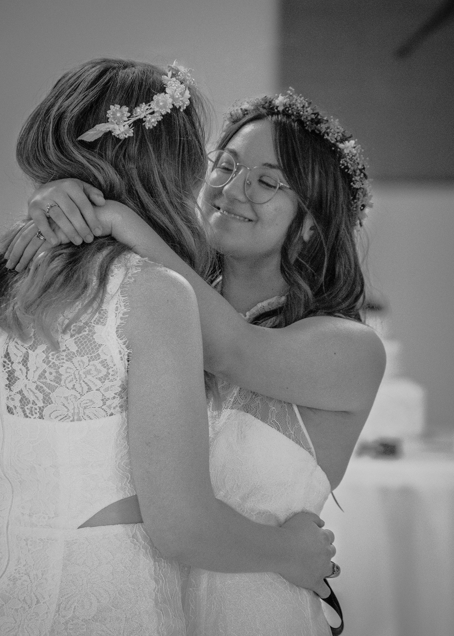 Two LGBTQ+ marriers have their first dance during their reception.