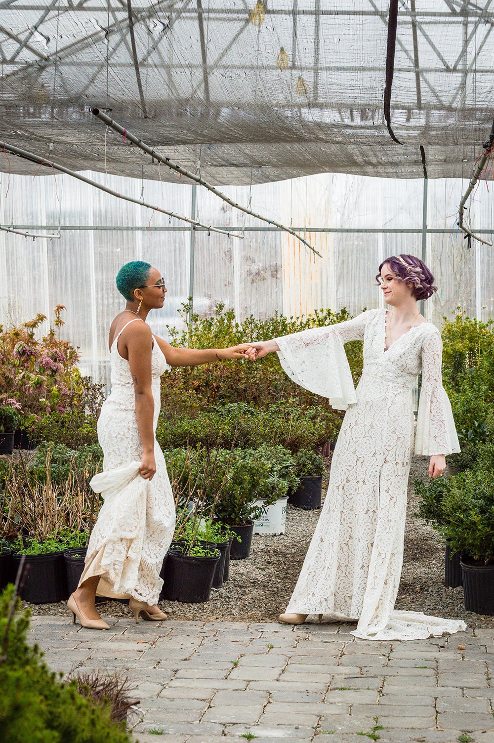 An LGBTQ+ couple takes their first dance during their elopement.