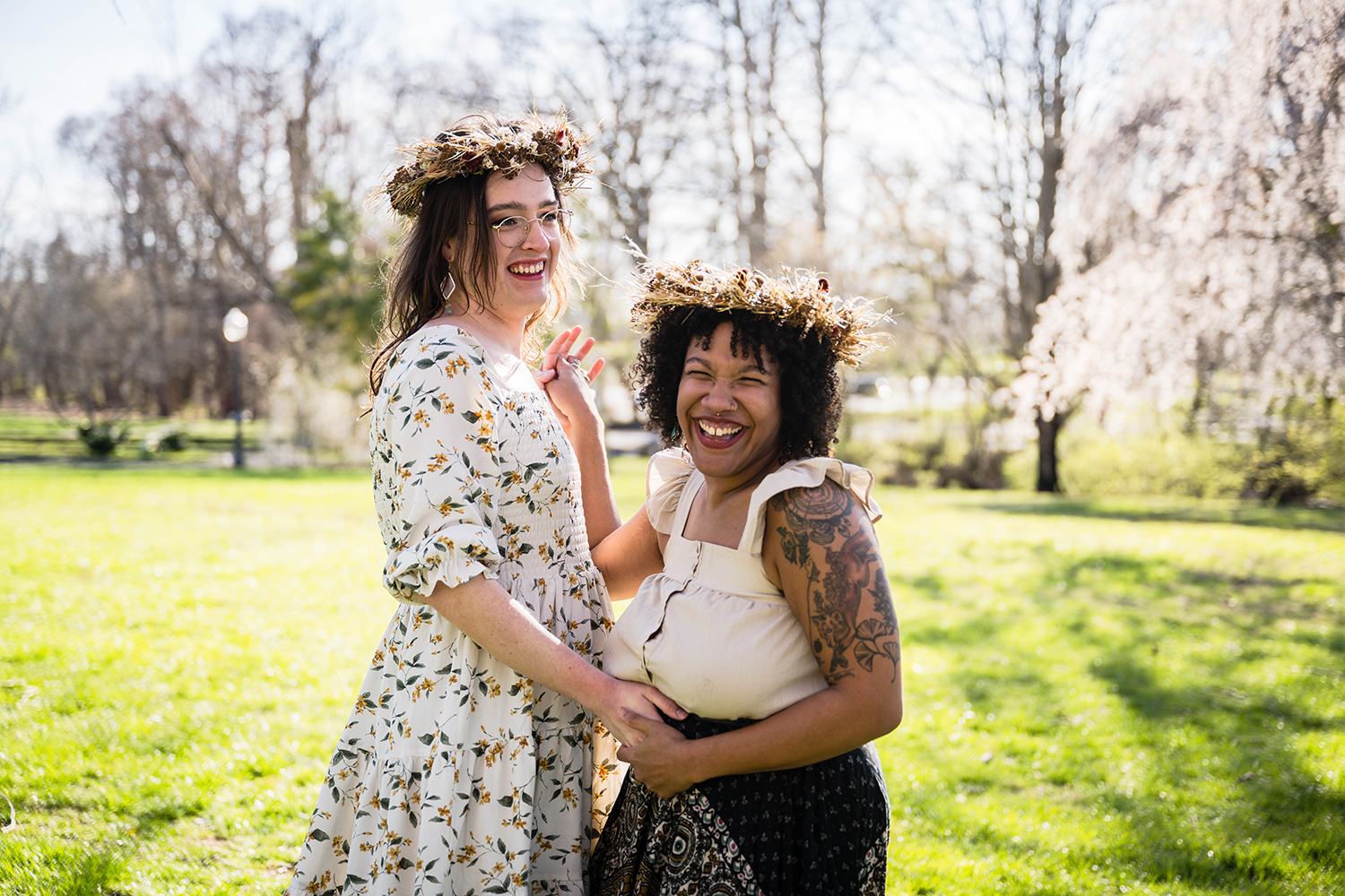 An LGBTQ+ couple has their first dance at Duck Pond in Blacksburg, Virginia on their elopement day.