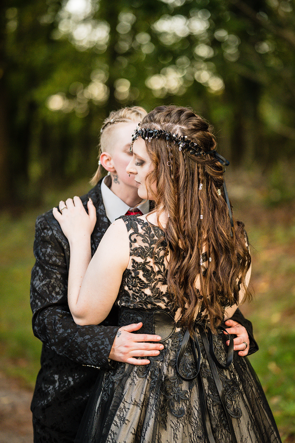 A lesbian couple embrace outside of their Roanoke Airbnb on their elopement day.