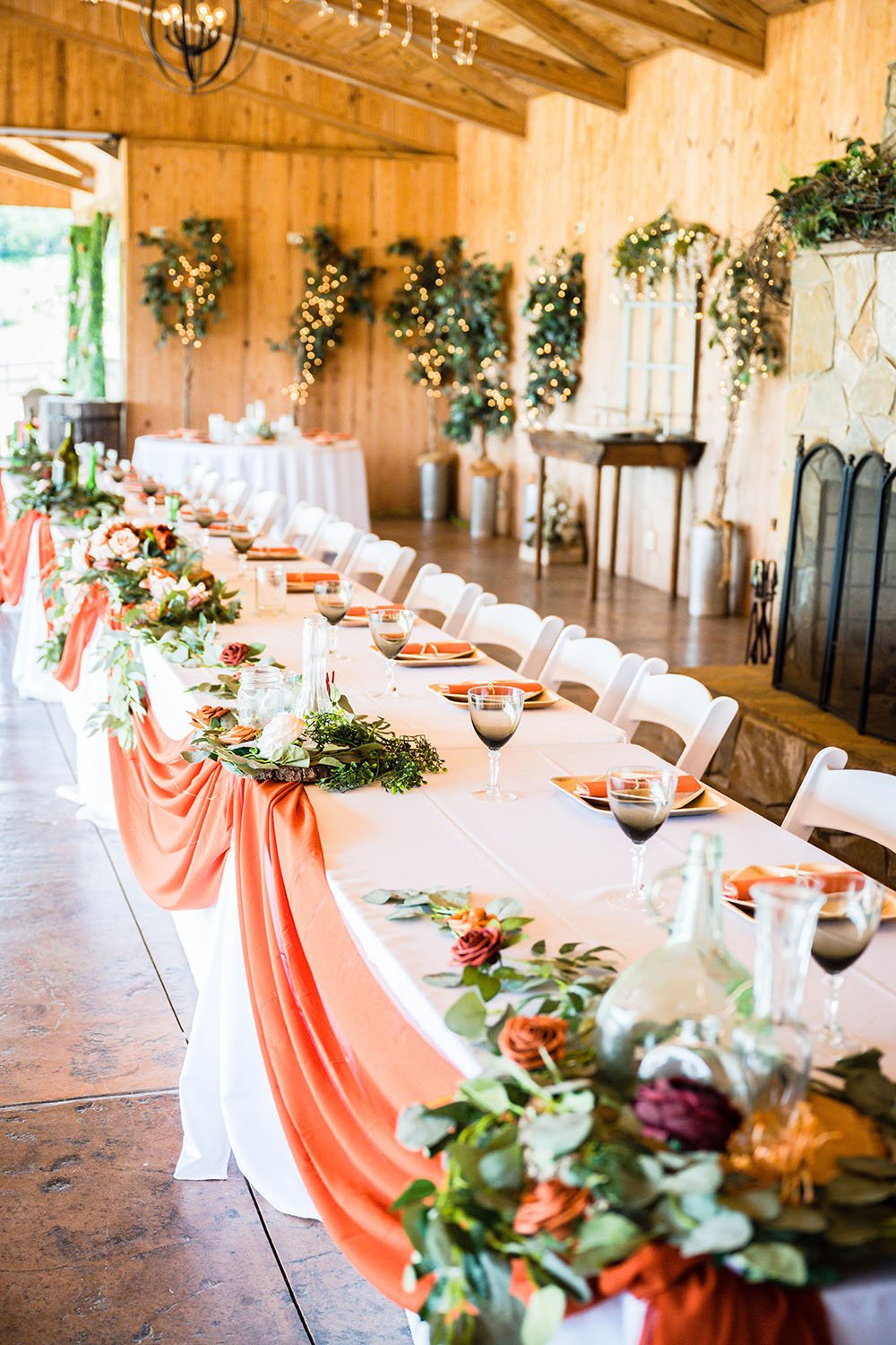 A long and large kings table for a wedding at The Pavilion at Black Water Junction photographed underneath the pavilion.