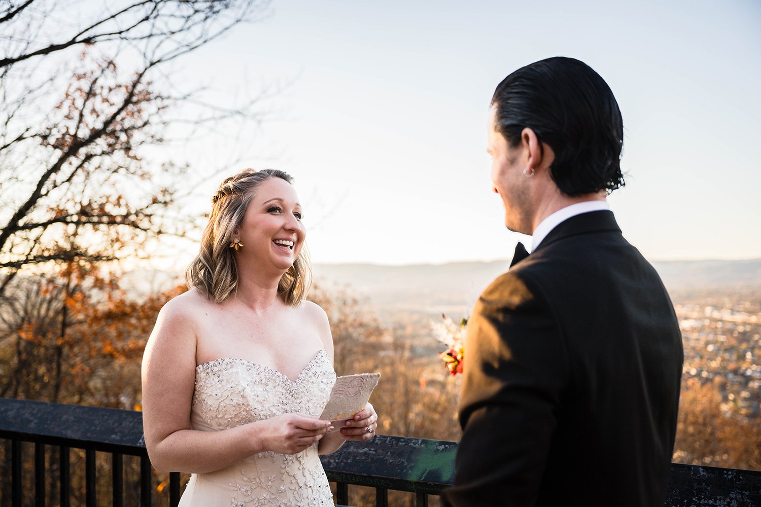 A couple on their elopement day exchange their vows at the Rockledge Overlook in Roanoke, Virginia.