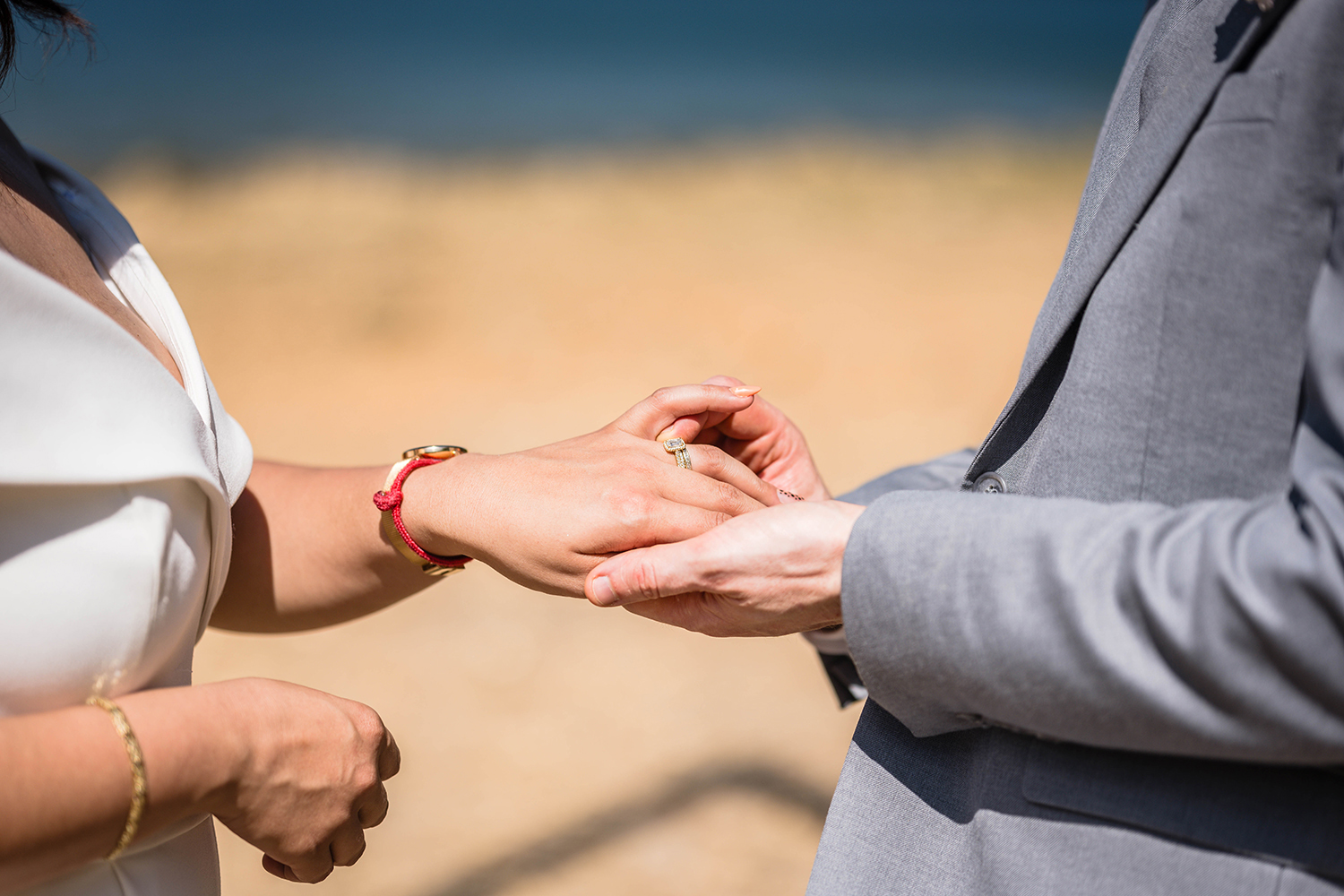 A couple on their elopement day exchanges rings after their vow exchange on the Blue Ridge Parkway in Virginia.