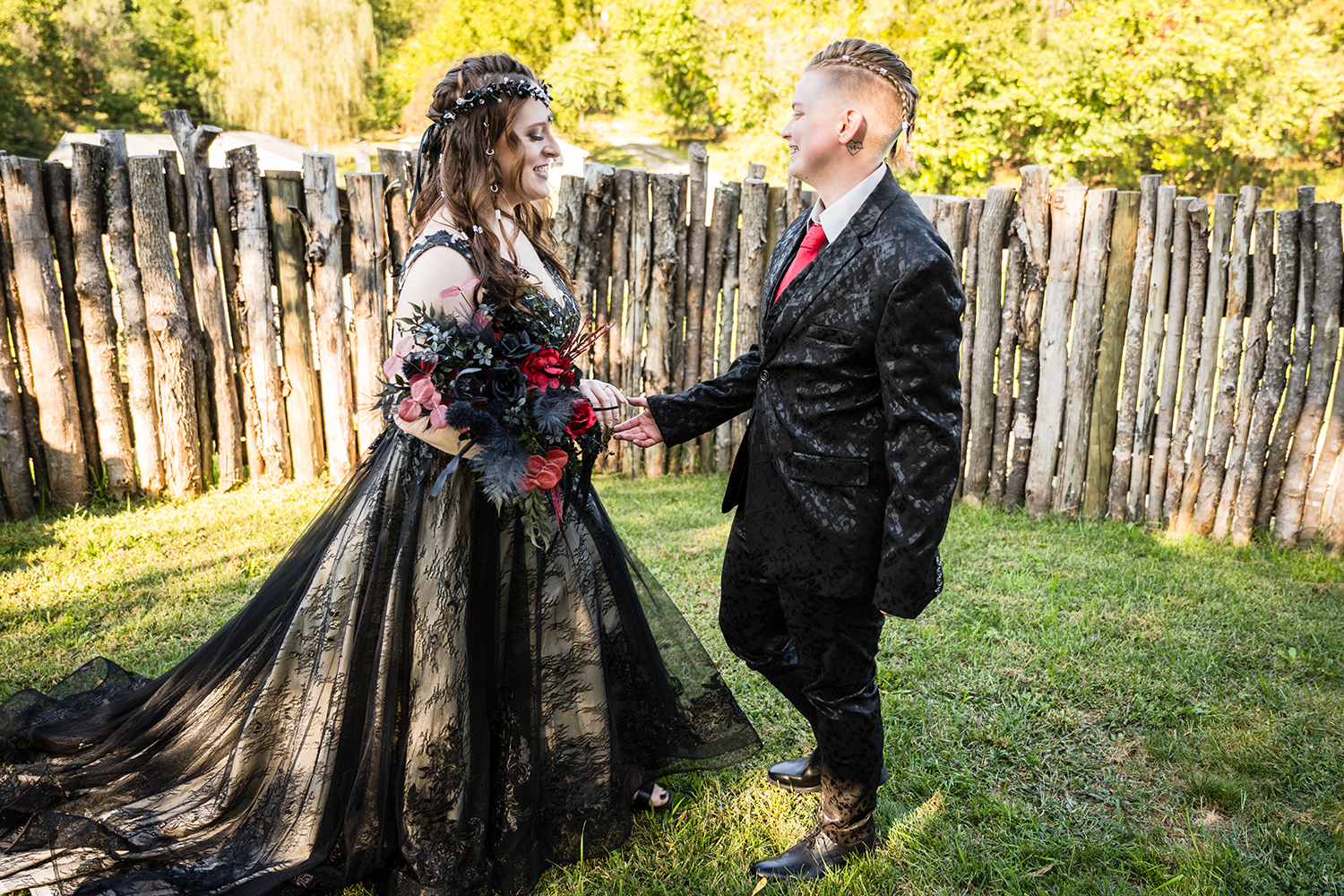 A couple smiles at one another and goes towards one another after their first look on their elopement day in Roanoke, Virginia at their Airbnb.