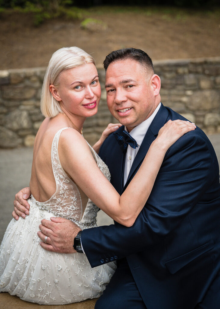 A couple poses together at Mill Mountain in Roanoke, Virginia.