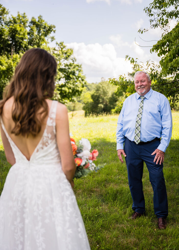 A bride on wedding day has a first look with her Dad along the Blue Ridge Parkway.