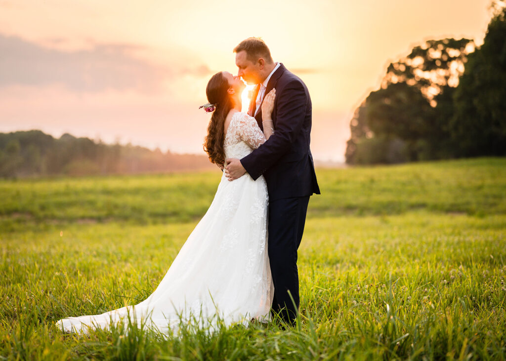 A wedding couple kisses during their Martinsville, Virginia elopement day.