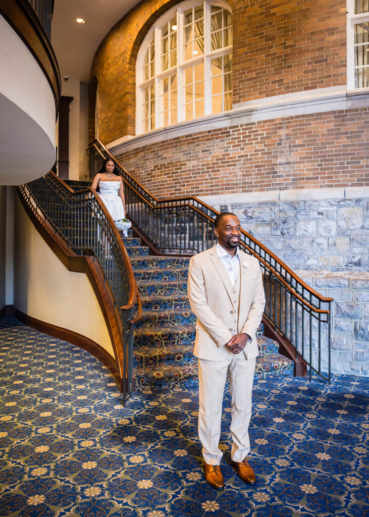 A Black elopement couple has a first look at Hotel Roanoke during their Downtown Roanoke wedding.