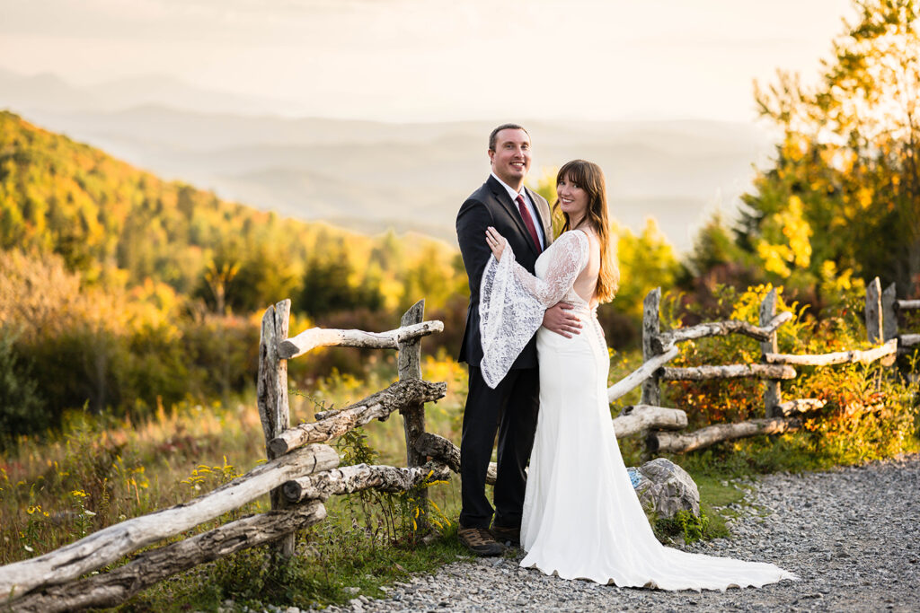 A couple poses for a photo along the Massie Gap trail on their elopement day in September.