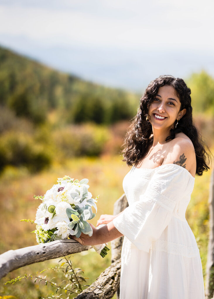 A woman poses along Massie Gap Trail.