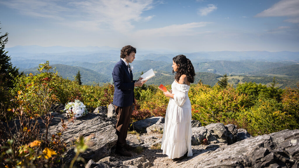 A couple has their wedding ceremony at Little Pinnacle for their Grayson Highlands State Park elopement day.
