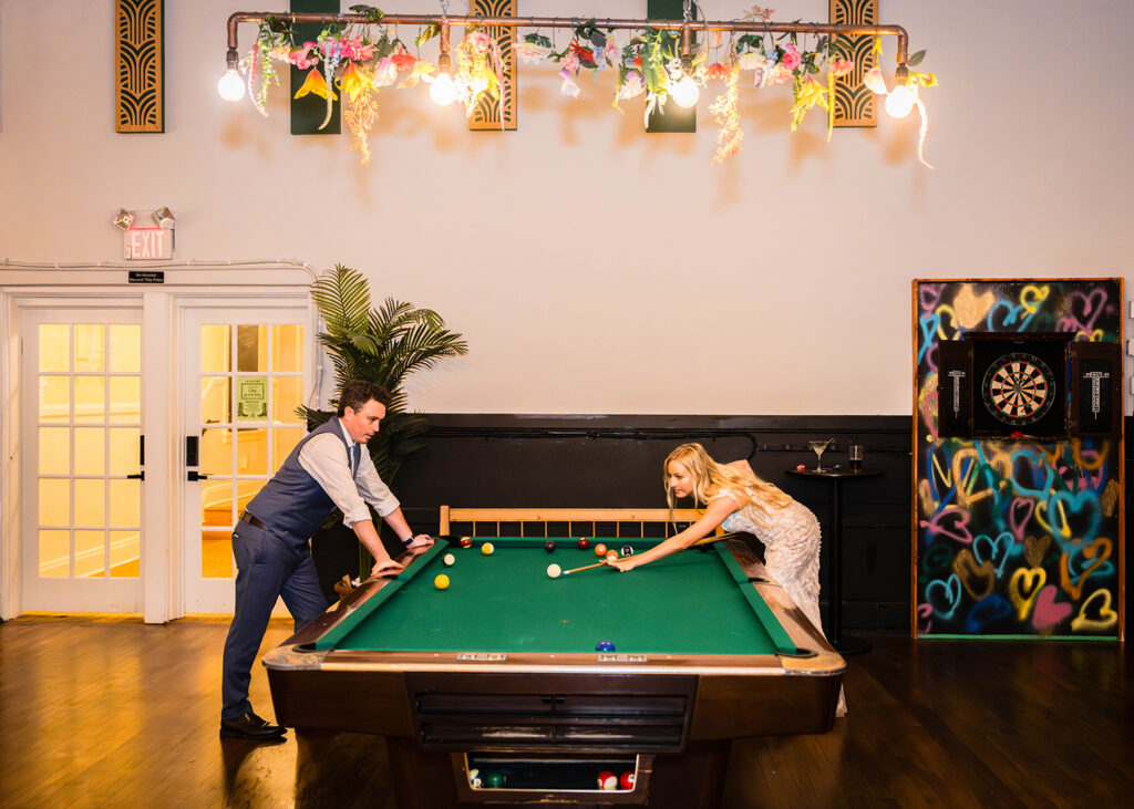 Two marriers play a round of billiards at The Black Twig in Sperryville, Virginia.