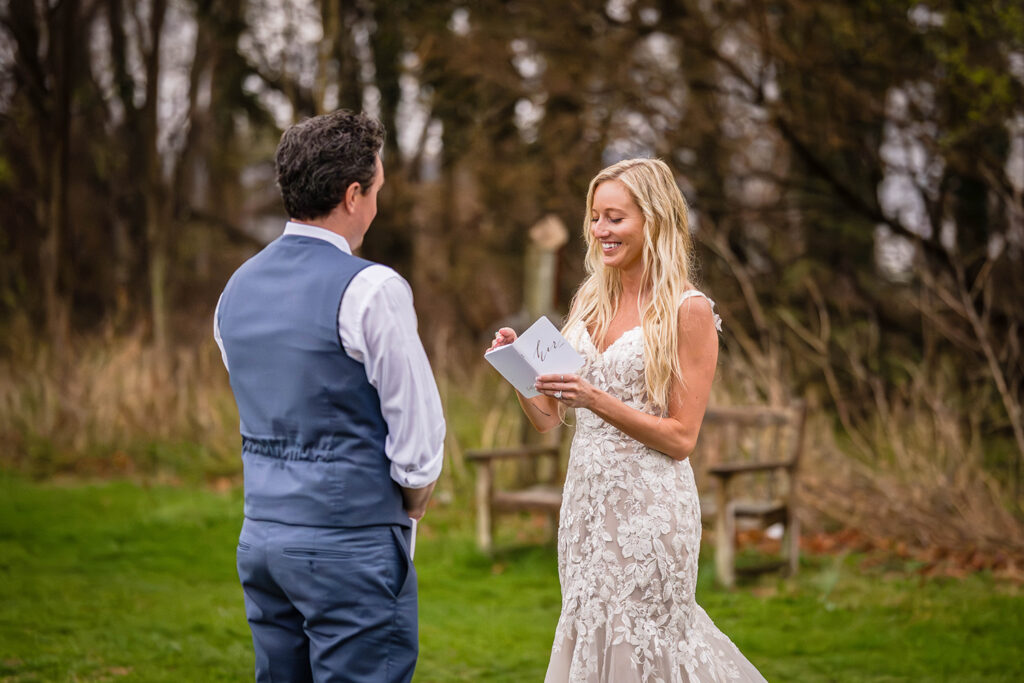 An elopement wedding couple read their private vows to one another in Sperryville, Virginia, just outside of Shenandoah National Park.